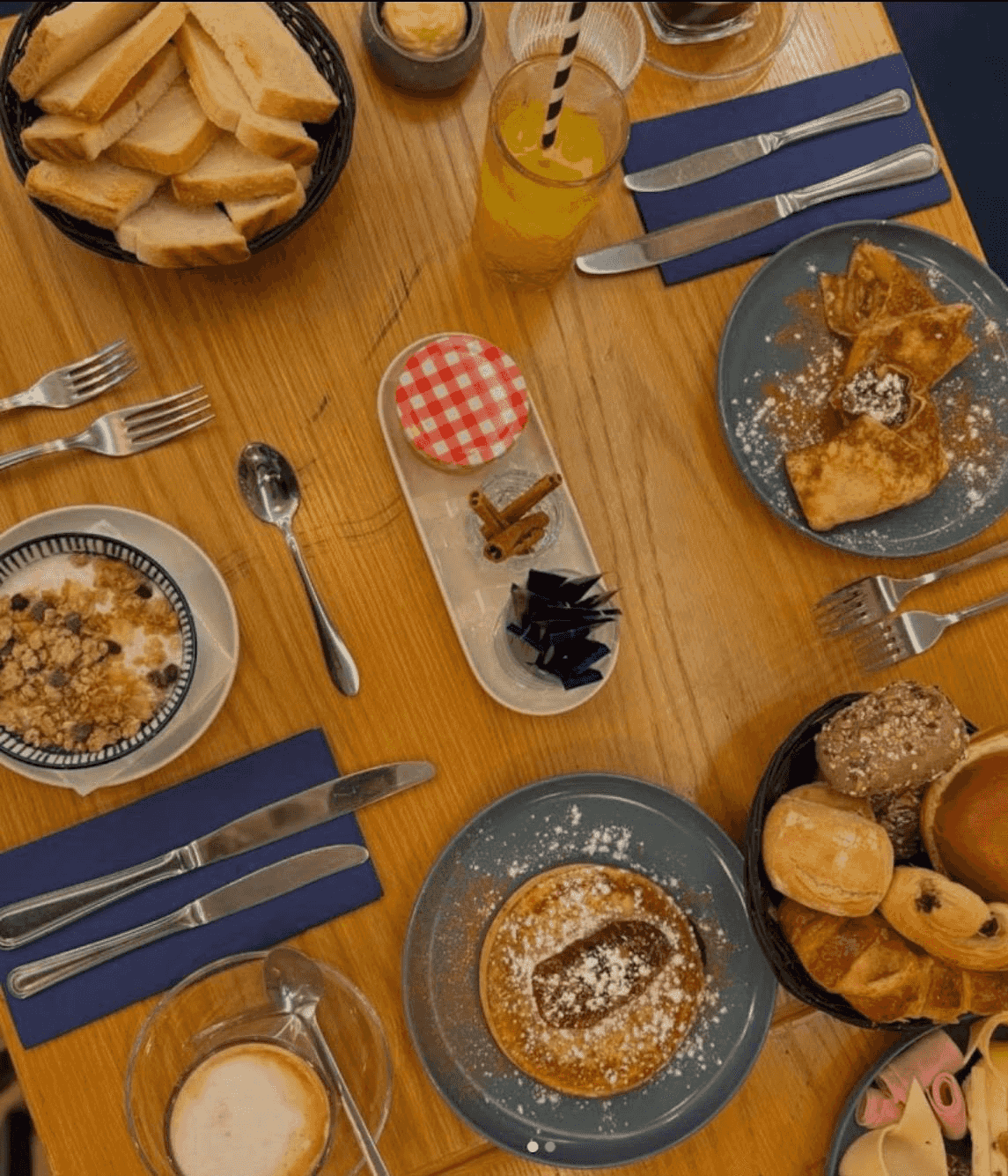 Shared Portuguese dishes arranged across a dining table