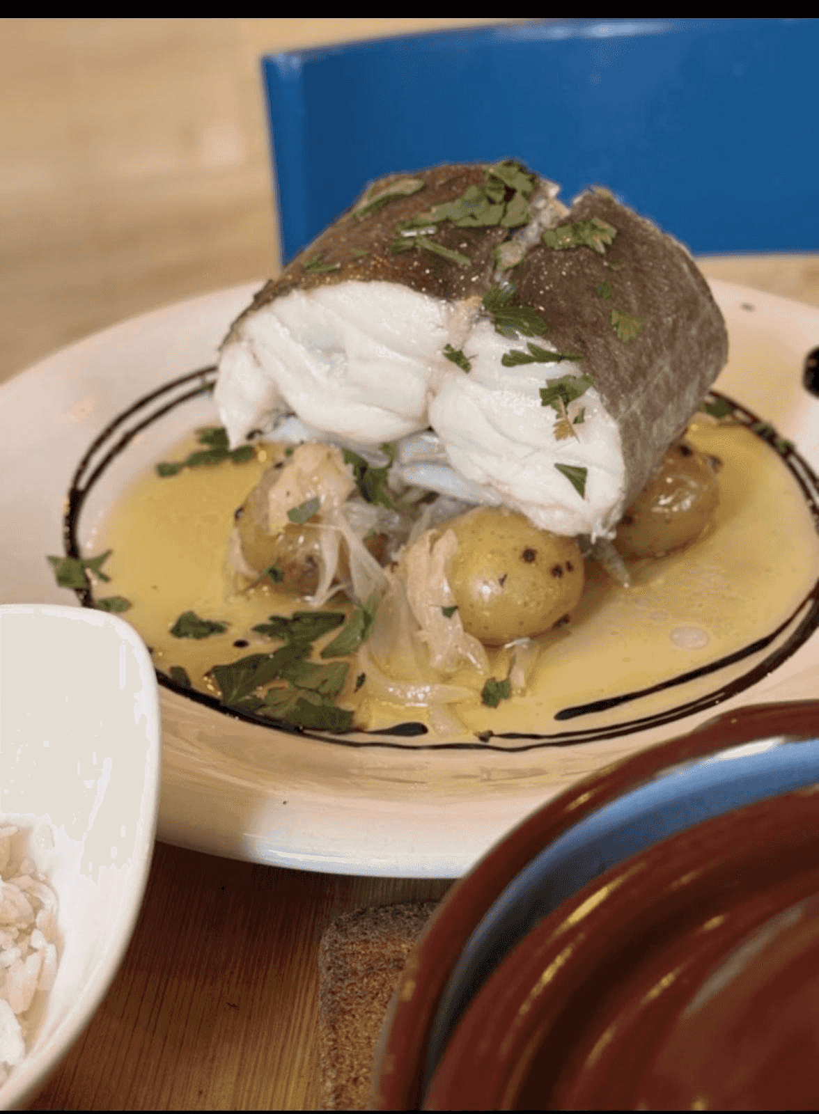 Steak with potatoes and sliced onion